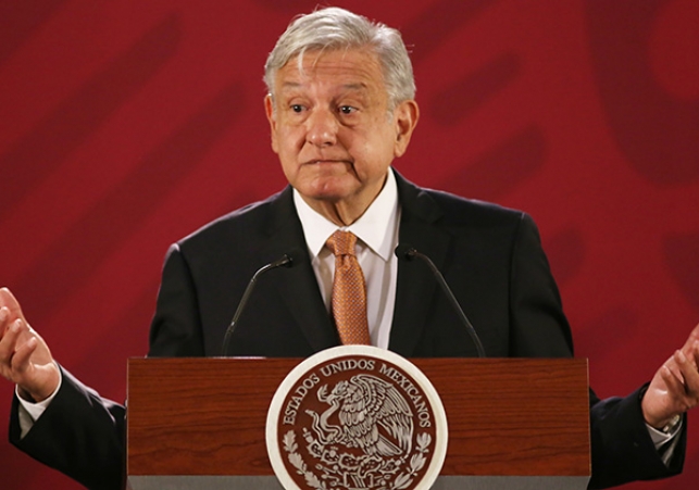 mexico_amlo_lectern_shrugging_stk_747x420